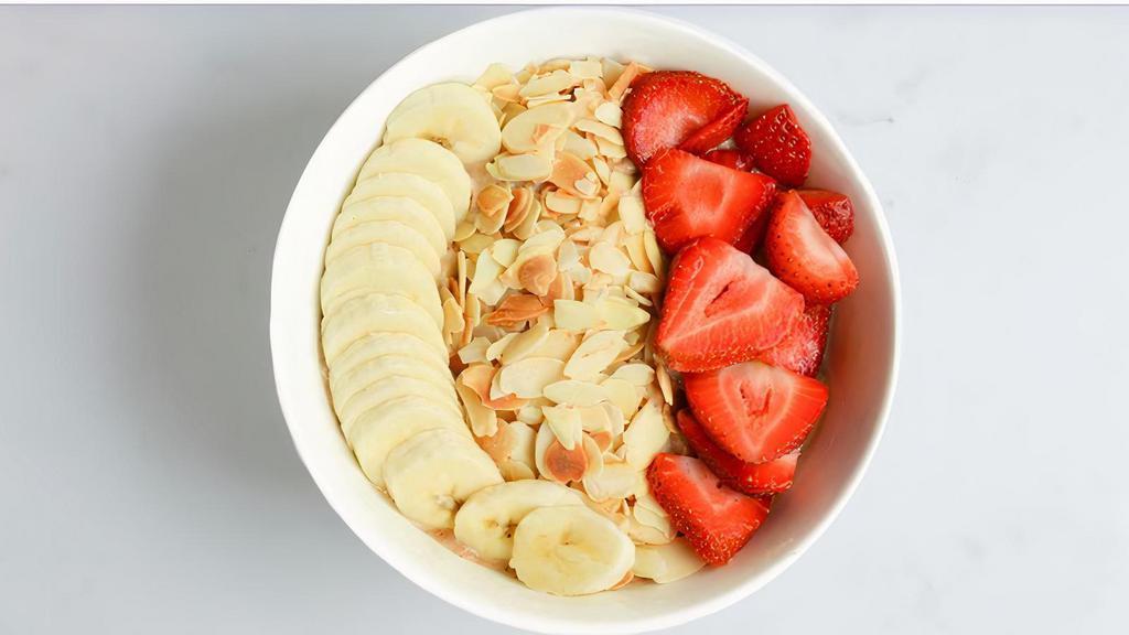 Ab&C · Acai, Banana, Almond Butter, Dates, Himalayan Sea Salt, Almond Milk, Topped with Banana, Strawberry, & Toasted Almond Flakes