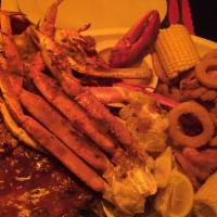 Bbq Feast · Whole lobster with baby back ribs, BBQ chicken, jumbo fried shrimp & snow crab legs. French ...