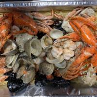 Italian Feast · Whole lobster, shrimp, mussels, clams, snow crab legs, hardshell crabs all served over fresh...