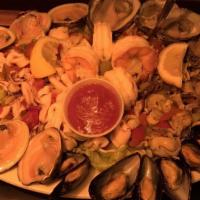 Cold Seafood Platter · 6 clams, 6 oysters, 4 shrimp cocktail, scungilli, calamari salad, & mussels