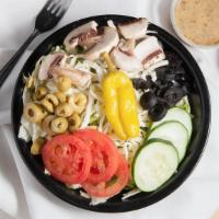 House Salad · Mushrooms, Onions, Green and Black Olives, Tomatoes, Cucumbers, Pepperoncini, Mozzarella