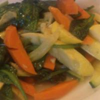 Sautéed Seasonal Vegetables · Green and yellow squash, broccoli, and spinach with a little bit of garlic.