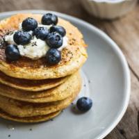 Blueberry Pancakes · 3 Buttery pancakes cooked to perfection and topped with fresh blueberries.
