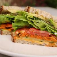 Garden Veggie · house made hummus, cucumber, avocado, sprouts, pickled carrots, lettuce, tomato, pickled pep...