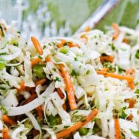 House Slaw · Green and  Red Cabbage Mix with house dressing