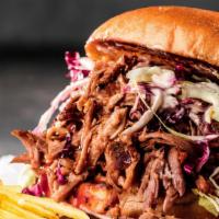 Pull Chicken · Sweet BBQ sauce mix pull chicken  with house slaw.