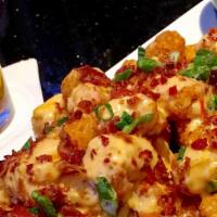 Disco Potato Tots  · Fried tots  with Bacon, three cheese and sour cream
