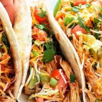 Pulled Chicken  Tacos  · Pulled Chicken with slow cook BBQ  sauce top with slaw and three cheese.