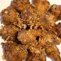 Yes Wings · Deep-fried chicken wing. Choice from our sour garlic black pepper sour or Thai spicy larb so...