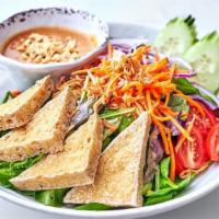 Garden Salad · Gluten free. Organic tofu, carrot, red cabbage, cucumber, shallot, radish, and mixed greens ...