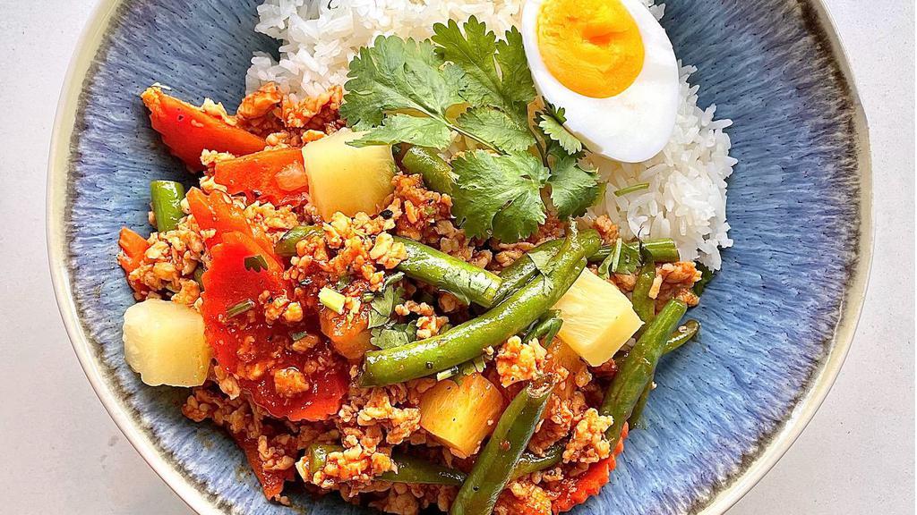 Phuket Beef · Stir fried ground beef with carrots, baby corn, green bean, pineapples, in island sweet sour sauce, served with rice and boiled egg topped with cilantro