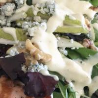 Pear Salad · Mixed greens, pears, toasted walnuts, and blue cheese with champagne vinaigrette.