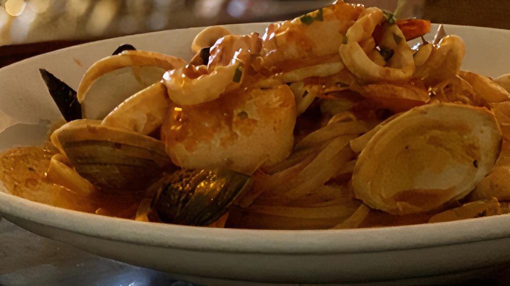 Miramar Seafood Linguine · Shrimp, scallops, clams, mussels, and calamari in marinara sauce.
