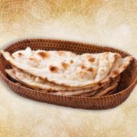 Naan  · House made pulled and leavened dough baked to perfection in an Indian clay oven