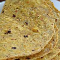 Methi Rotis · Five pieces. Wheat flour kneaded with fenugreek leaves, garlic and turmeric.
