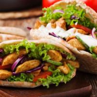 Chicken Kebab Pita Sandwich · Boneless pieces of chicken with your choice of toppings wrapped in fresh pita.