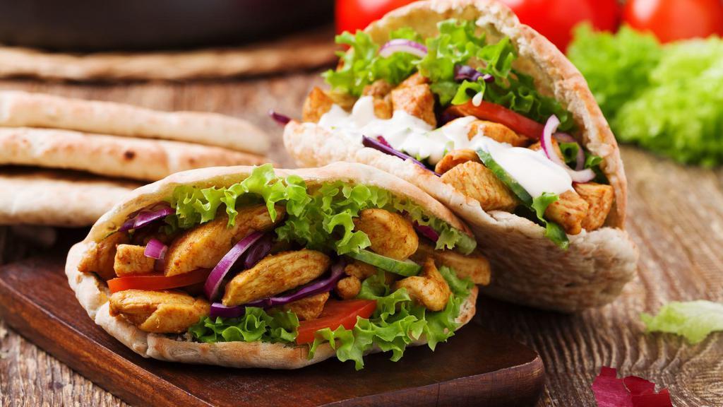 Chicken Kebab Pita Sandwich · Boneless pieces of chicken with your choice of toppings wrapped in fresh pita.