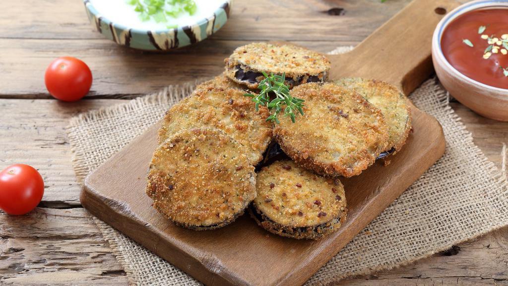 Fried Eggplant · Fresh eggplant fried in with herbs and spice.