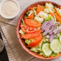 Tossed Salad · Lettuce, tomatoes, onions, cucumbers, olives, oil, vinegar.