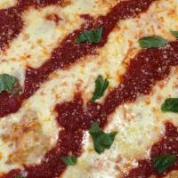 Grandma Square Pizza · Mozzarella garlic and sauce topped with fresh basil.
