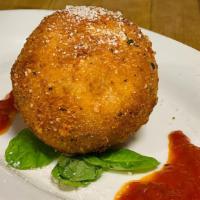 Homemade Rice-Ball · Our Homemade Risotto Rice-Balls. Two versions:
Meat - stuffed with ground beef & mozzarella ...