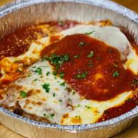 Chicken Parm Entree · Breaded Chicken Cutlets topped with Melted Mozzarella Cheese and Homemade Tomato Sauce