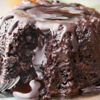 Chocolate Lava Cake · Dark chocolate cake enrobed with dark chocolate, filled with a dark chocolate truffle that ...