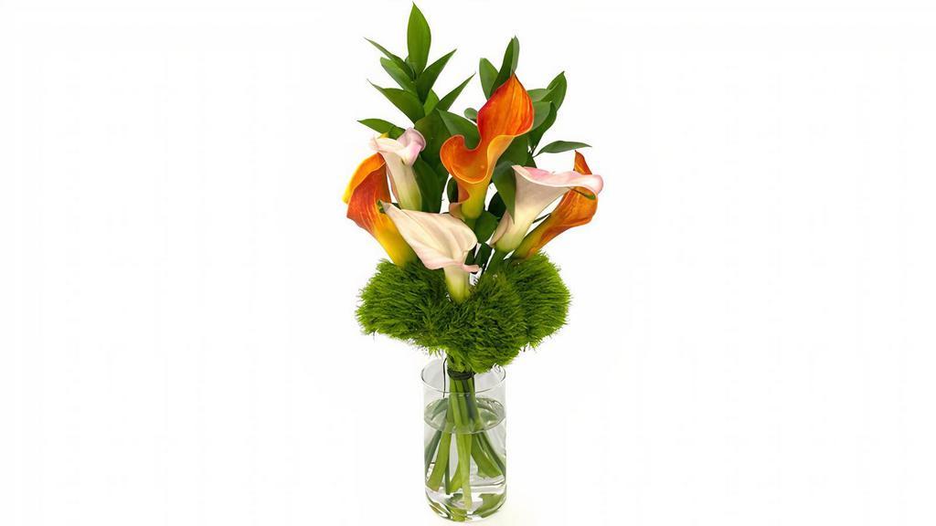Calla Spray · For calla lovers, this elegant display of mini calla lilies in pink and orange with a support of green trick and ruscus will bring a smile to your face. Designed for long lasting enjoyment, be sure to change the water daily.