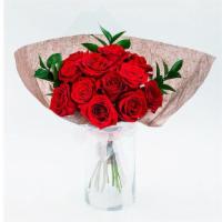 Classic Red · This classic hand-tied arrangement is presented without a vase as a compact dome of a dozen ...