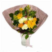 Sunnyside · The Sunnyside bouquet is presented without a vase as a dome of yellow roses, spider mums, wh...