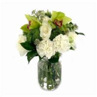 Honeydew · A modern hand-tied bouquet featuring roses, green dianthus, lisianthus, and green cymbidium ...