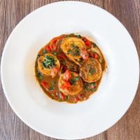 Veal Monte Bianco · Comes with spinach, roasted peppers and cheese in a Marsala wine sauce.