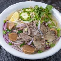 Pho Special · Sliced fillet beef, shank beef, beef ball and rice noodle soup.