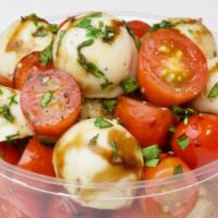 Caprese Salad · 'Mozzarella', cherry tomato, fresh basil, balsamic reduction.
