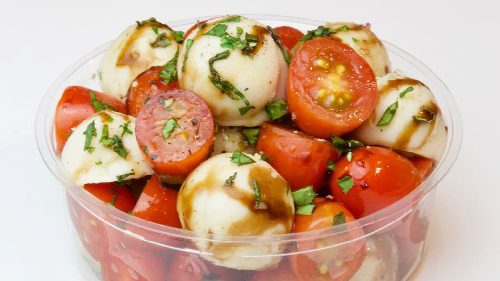 Caprese Salad · 'Mozzarella', cherry tomato, fresh basil, balsamic reduction.