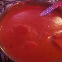Chicken Tikka Masala  · Creamy sauce with smoked peppers and tomatoes