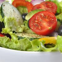 Greek Salad · Romaine, black olives, feta cheese, onions, and tomatoes.