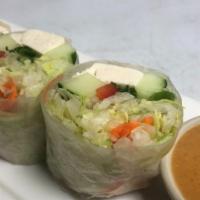 Thai Summer Roll · Steamed Tofu, Bell Pepper, Mint, Iceberg Lettuce Wrapped in Rice Paper served with our Homem...