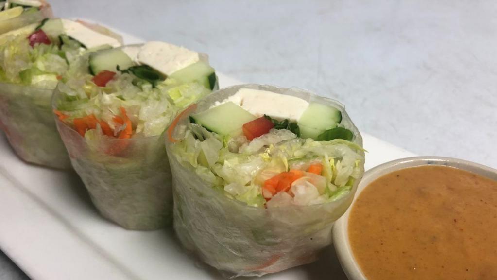 Thai Summer Roll · Steamed Tofu, Bell Pepper, Mint, Iceberg Lettuce Wrapped in Rice Paper served with our Homemade Peanut Sauce