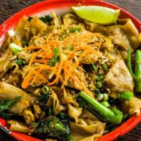 Pad See Yue · Flat rice noodle, baby Chinese broccoli, egg in a dark soy sauce, with choice of protein.