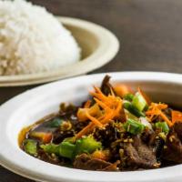 Slow Cooked Beef Panang · Tender beef medallions, bell pepper served with jasmine rice.
