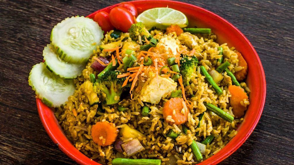 Lemongrass Fried Rice · Lemongrass, chili, garlic, red onion, turmeric, cucumber, string beans, egg, with choice of protein.