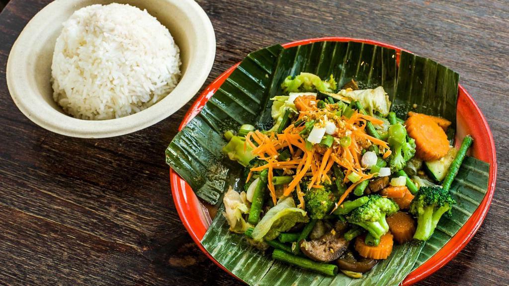 Sauteed Mixed Vegetables In Garlic Sauce · String beans, carrot, mushroom, eggplant, zucchini, broccoli, bell pepper. Served with white rice.