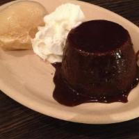 Molten Chocolate Cake With Caramel Sea Salt Ice Cream · Homemade Molten Chocolate Cake served with half scoop of all natural small batch homemade ca...