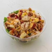 Autumn Harvest · Romaine, Spring Mix, Grilled Chicken, Corn, Apple, Dried Cranberry, Candied Walnut, and Ched...