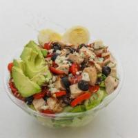 Cobb · Romaine, Bacon, Grilled Chicken, Egg, Black Olive, Tomato, and Blue Cheese crumbles with Avo...