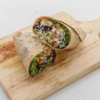 Falafel Wrap · Falafel, Romaine, Diced Tomato, Red Onion, Tahini Spread, and a Tzatziki Drizzle on Whole Wh...