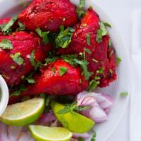 Chicken Tikka · Boneless white meat chicken marinated in aromatic spices roasted in a day oven.