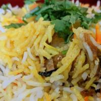 Vegetable Biryani · Vegetable biryani basmati rice cooked with mixed vegetables a blend of herbs and saffron.