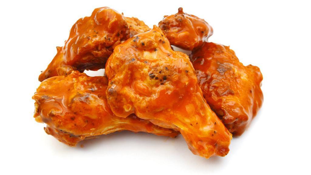Buffalo Wings · Chicken wings breaded and fried, then tossed in buffalo sauce.